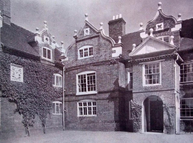 THE ENTRANCE FRONT WITH THE KITCHEN AND BREW-HOUSE WING ON THE LEFT
