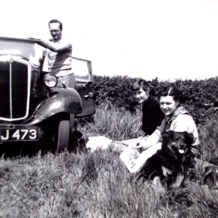 Ron and Betty Mowday, their dog Bunty, and Mother with her "Italian Boy Haircut"  